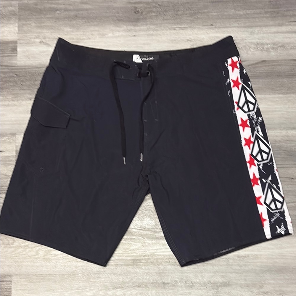 Volcom Black and Red Board Shorts with Geometric Stripe